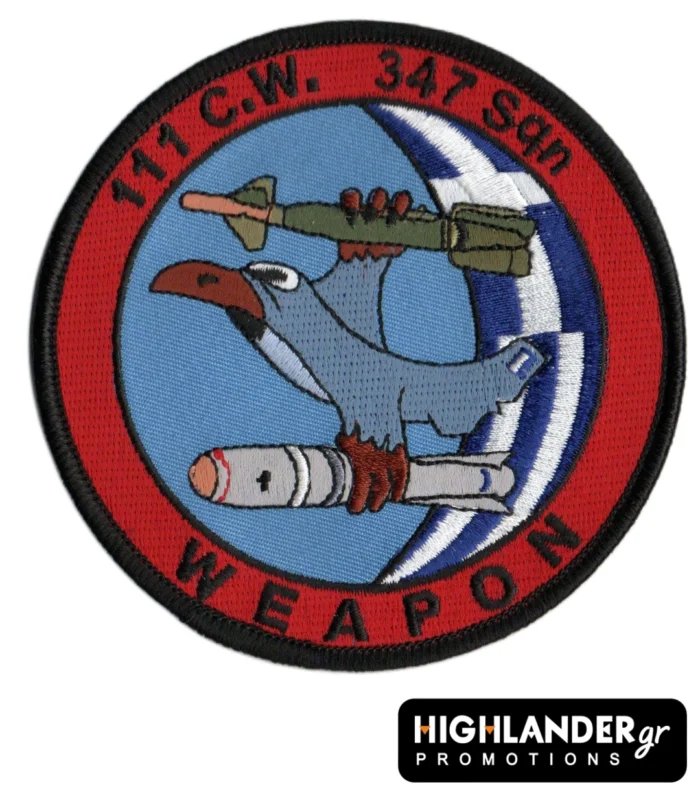 Embroidered patch with blue hawk holding missile and bomb, blue background, HAF roundel, red border, "111 C.W. 347 Sqn WEAPON" text.