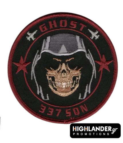 Embroidered patch with skull in pilot helmet, red stars, aircraft silhouettes, "GHOST" and "337 SQN" text, red border