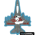 PVC patch shaped as a top-view F-16 with a white ghost, red missiles, and red "Ghost 337 M" text, blue border.
