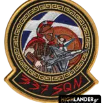 Embroidered patch with Spartan warrior holding F-16, Greek key border, HAF roundel, gold edge, and red "337 SQN" text.