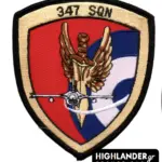 Embroidered patch with golden winged sword, front-view jet, red and blue background, and Hellenic Air Force roundel, "347 SQN" text.