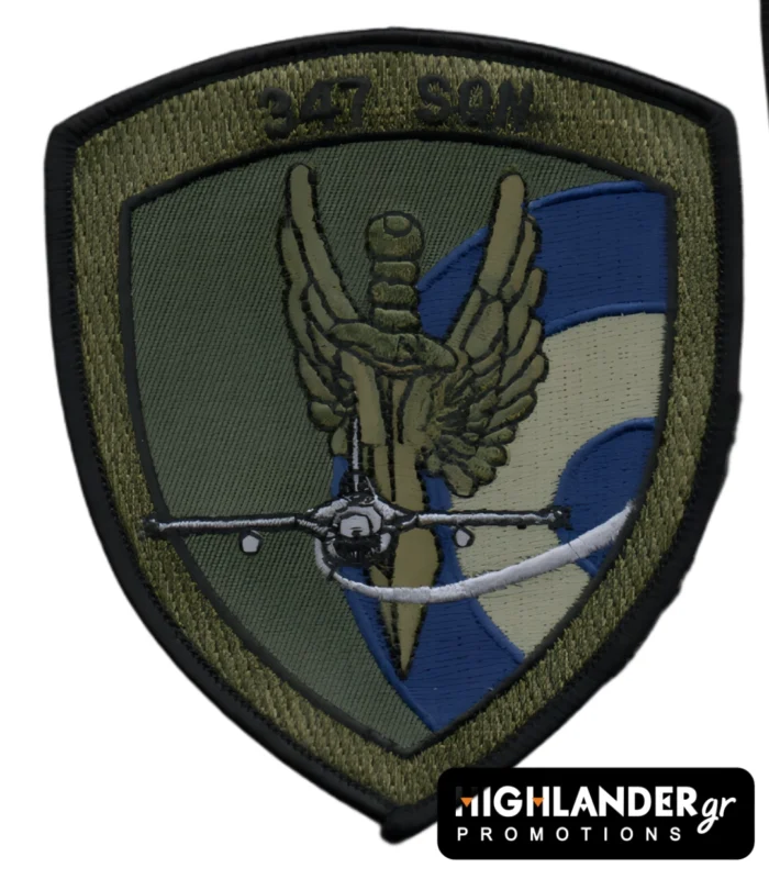 Low visibility embroidered patch with golden winged sword, front-view jet, green/grey shield, blue and sand Hellenic Air Force roundel, and “347 SQN” text.