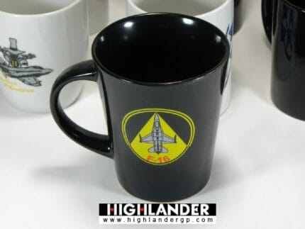 Black ceramic mug with yellow F-16 emblem and red lettering, Hellenic Air Force.
