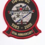 Embroidered patch with front-view Dornier Do-28 d2, globe, laurel branches, Acropolis, gold "1983 – 2008" and "25th Anniversary" text, red border.