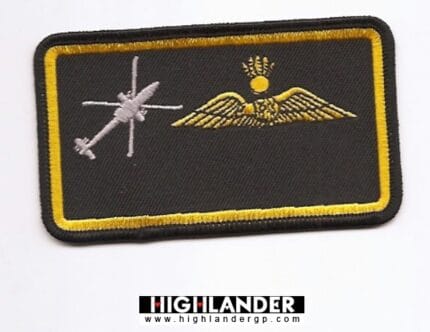 Embroidered patch with silver helicopter silhouette and gold pilot wings with crown and sun on black background, yellow border.
