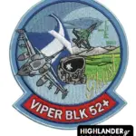 Embroidered patch with F-16 Viper BLK 52+, Greek flag, pilot helmet, and gold "Ghost" script, blue border.