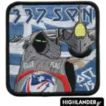 Embroidered patch with hooded Grim Reaper, F-16 jet with yellow canopy, “337 SQN” and “BLUE FLAG” text, blue striped background.