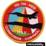 110 CW – CORROSION CONTROL patch with two fighters and colorful triangular background