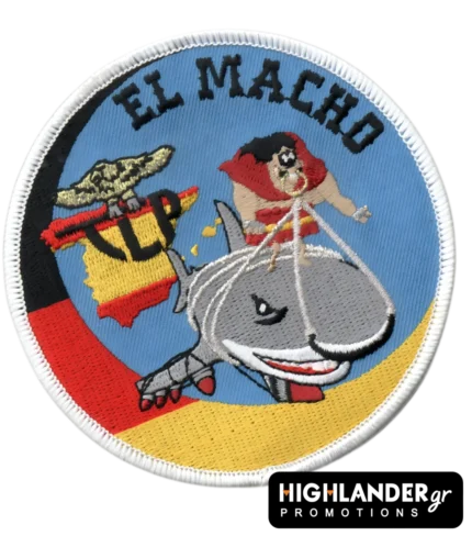 TLP El Macho patch with cartoon man riding a shark and Spanish flag