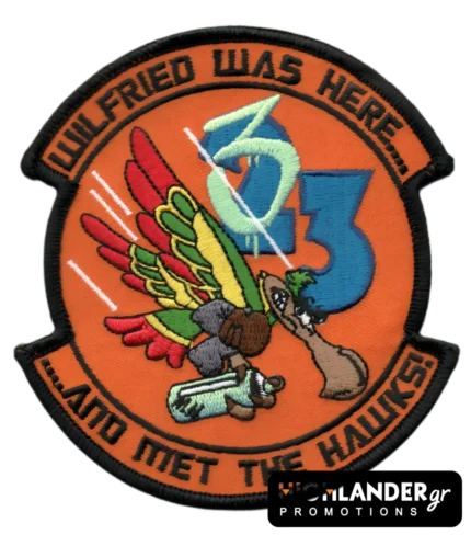 Military patch showing Wilfried visiting 23 Squadron – humorous design with colorful wings