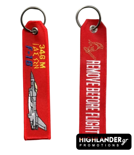 Κόκκινο μπρελόκ αεροπορίας 346 Μοίρα Ιάσων. Η μία πλευρά δείχνει το F-16 και κείμενο "346 Μ ΙΑΣΩΝ". Η άλλη γράφει "REMOVE BEFORE FLIGHT" με έμβλημα περικεφαλαίας.