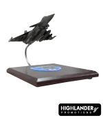 Desktop scale model of a Hellenic Air Force Rafale fighter jet mounted on a wooden base. The base features the HTAF (ATA) eagle emblem.