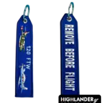Blue rectangular keychain displaying T-6 and T-2 aircraft with 120 FTW text on one side, and REMOVE BEFORE FLIGHT on the other.