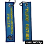 Blue embroidered keychain for 2nd MSEP. Side A shows the Greek Air Force text and unit emblem. Side B shows "PLUTO PICTURE" in yellow text