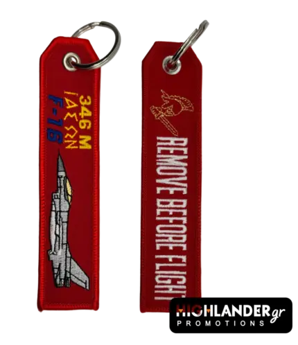Red embroidered keychain from Highlander Promotions. Side A: F-16 aircraft and "346 M ΙΑΣΩΝ" text. Side B: "REMOVE BEFORE FLIGHT" with 346 Squadron golden helmet emblem.
