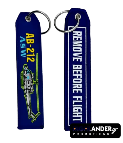 Blue embroidered keychain for AB-212 ASW helicopter. Side A shows the helicopter and text. Side B shows "REMOVE BEFORE FLIGHT" in white text.