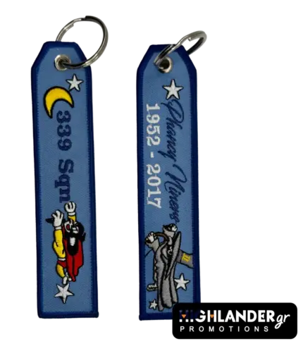 Embroidered keychain from Highlander Promotions. Side A: "339 Sqn" with Mighty Mouse mascot. Side B: "Phancy Niners 1952-2017" with vintage character art.