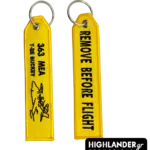 Yellow embroidered keychain for the HAF 363 Air Training Squadron. Side A shows T-2E Buckeye silhouette and 363 ΜΕΑ text.