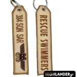 Sand-colored embroidered keychain for the HAF 384 SAR Squadron. Side A shows 384 SQN SAR text and the Search and Rescue emblem; Side B shows Rescue Swimmers text.