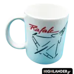 A white ceramic mug featuring a minimalist black line-art drawing of a Rafale fighter jet and the word 'Rafale' written in red cursive.