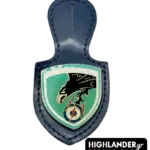 This premium leather breast patch honors the 337 Squadron "Ghost," designed for durability and style on HAF flight suits and leather jackets. It features a multi-color enameled metallic shield depicting a black falcon grasping lightning bolts, mounted on navy blue leather, and displays the motto "Strength combined with Wisdom."