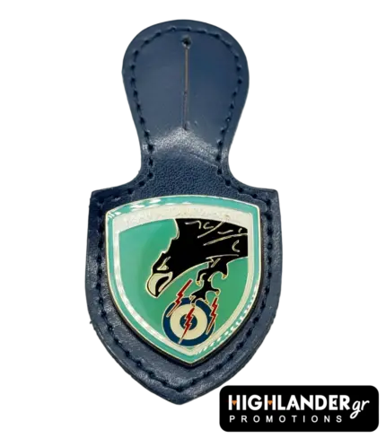 This premium leather breast patch honors the 337 Squadron "Ghost," designed for durability and style on HAF flight suits and leather jackets. It features a multi-color enameled metallic shield depicting a black falcon grasping lightning bolts, mounted on navy blue leather, and displays the motto "Strength combined with Wisdom."