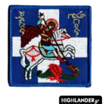 Square embroidered morale patch showing Saint George on a white horse slaying a dragon against a blue and white Greek flag background.