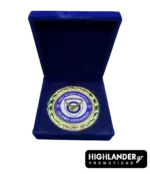 Gold-tone commemorative medallion of the Hellenic Air Force General Staff displayed in a premium blue velvet box.