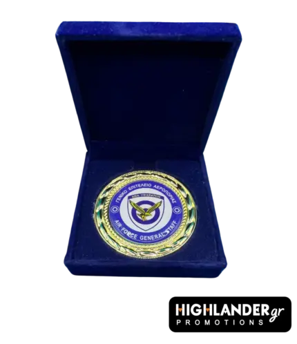 Gold-tone commemorative medallion of the Hellenic Air Force General Staff displayed in a premium blue velvet box.