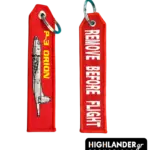Red embroidered aviation keychain. Side A: Side-profile silhouette of a P-3 Orion with yellow text. Side B: Bold white "REMOVE BEFORE FLIGHT" text.