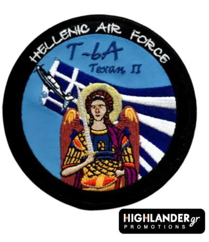 Round embroidered aviation patch featuring a T-6A Texan II aircraft and Archangel Michael over a waving Greek flag.