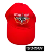 Bright red children's baseball cap featuring a white embroidered fighter jet and the text "FUTURE PILOT".