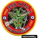 Round embroidered military patch for 348 MTA Weapon Egress featuring the F-4 Spook mascot, an RF-4E jet, and dates 1953-2017.