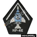 Pentagonal embroidered patch featuring the "Spook" mascot with a camera over the silhouette of an RF-4E Phantom II aircraft, with the text "RF-4E" at the bottom.