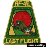 Trapezoid-shaped green and yellow embroidered patch featuring an RF-4E Phantom II jet over a red sun with "LAST FLIGHT" text.