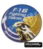 Dual-sided metal challenge coin: one side shows an eagle head with "F-16 Fighting Falcon", the other features a tiger with "F-16 Aegean Tiger" and a paw print.