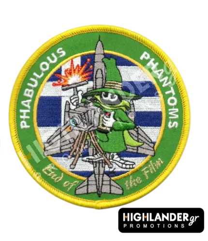 Round embroidered farewell patch featuring the Spook mascot, a camera, an RF-4E silhouette, and the Greek flag background.