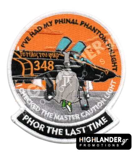 Round embroidered military patch featuring the F-4 Spook mascot walking away from a HAF 348 Squadron Phantom jet under an orange sky