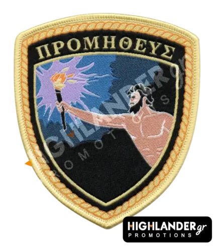 Shield-shaped embroidered patch for the Greek Navy ship Prometheus (A-374) featuring the titan Prometheus holding a burning torch.